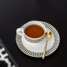 Filiżanka do herbaty 230 ml biało-czarno-złota - MetroChic